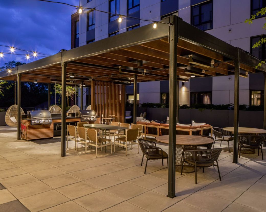 Outdoor terrace brightly lit in the evening