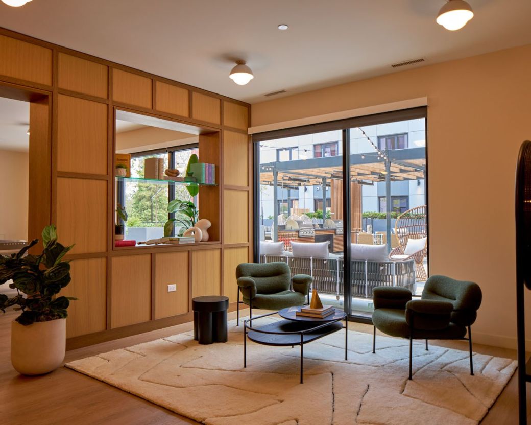 Lounge and game room looking out to the outdoor terrace